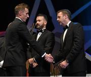 24 October 2014; Cillian Buckley, Kilkenny, is congratulated on receiving his All-Star award by Dave Sheeran, right, Managing Director, Opel Ireland, during the 2014 GAA GPA All-Star Awards, sponsored by Opel. Convention Centre, Dublin. Picture credit: Brendan Moran / SPORTSFILE