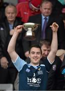 25 October 2014; Scotland captain Michael Russell lifts the cup. 2014 U21 Hurling/Shinty International, Ireland v Scotland, Pairc Esler, Newry, Co. Down. Picture credit: Matt Browne / SPORTSFILE
