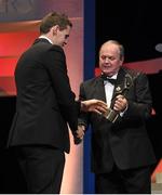 24 October 2014; TJ Reid, Kilkenny, is presented with his All-Star award by Uachtarán Chumann Lúthchleas Gael Liam Ó Néill during the 2014 GAA GPA All-Star Awards, sponsored by Opel. Convention Centre, Dublin. Picture credit: Brendan Moran / SPORTSFILE