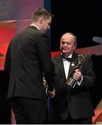 24 October 2014; Seamus Callanan, Tipperary, is presented with his All-Star award by Uachtarán Chumann Lúthchleas Gael Liam Ó Néill during the 2014 GAA GPA All-Star Awards, sponsored by Opel. Convention Centre, Dublin.  Picture credit: Brendan Moran / SPORTSFILE