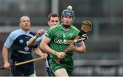 25 October 2014; Conor Lehane, Ireland, in action against Louis Munro, Scotland. 2014 Senior Hurling/Shinty International, 2nd Leg, Ireland v Scotland, Pairc Esler, Newry, Co. Down. Picture credit: Matt Browne / SPORTSFILE