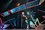 24 October 2014; Dessie Farrell, right, CEO, GPA, is interviewed by MC Michael Lyster during the 2014 GAA GPA All-Star Awards, sponsored by Opel. Convention Centre, Dublin. Picture credit: Brendan Moran / SPORTSFILE