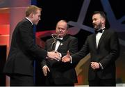 24 October 2014; Shane Dowling, Limerick, is presented with his All-Star award by Uachtarán Chumann Lúthchleas Gael Liam Ó Néill and Donal Og Cusack, right, Chairman, GPA, during the 2014 GAA GPA All-Star Awards, sponsored by Opel. Convention Centre, Dublin. Picture credit: Brendan Moran / SPORTSFILE