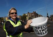 27 April 2007; Local volunteer Clodagh Dunne, from Dublin, collecting donations on O'Connell Bridge, during the Special Olympics &quot;Road to China&quot; Collection Day, the aim of which is to provide more opportunities for people with a learning difficulty in their own communities and to help prepare Team Ireland for the 2007 World Games in China in October. O'Connell Bridge, Dublin. Picture credit: David Maher / SPORTSFILE