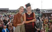 27 April 2007; Karen Murphy from Kinsale, Co. Cork, who won the Best Dressed Lady Competition, is presented with her prize from Yasmin Le Bon at the Punchestown National Hunt Festival. Punchestown Racecourse, Co. Kildare. Photo by Sportsfile