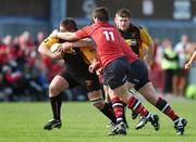 28 April 2007; Rhys Thomas, Newport Gwent Dragons, is tackled by Ian Dowling, 11, and Denis Leamy, Munster. Magners League, Munster v Newport Gwent Dragons, Musgrave Park, Cork. Picture credit: Brendan Moran / SPORTSFILE