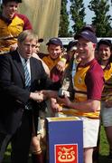 28 April 2007; Bruff captain Brendan Deady is presented with the trophy by IRFU President Peter Boyle. AIB League Division 3 Final, Wanderers v Bruff, Templeville Road, Dublin. Picture credit: Ray McManus / SPORTSFILE