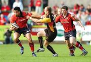 28 April 2007; Lifeimi Mafi, Munster, is tackled by Richard Fussell, Newport Gwent Dragons. Magners League, Munster v Newport Gwent Dragons, Musgrave Park, Cork. Picture credit: Brendan Moran / SPORTSFILE