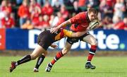 28 April 2007; Barry Murphy, Munster, is tackled by Aled Thomas, Newport Gwent Dragons. Magners League, Munster v Newport Gwent Dragons, Musgrave Park, Cork. Picture credit: Brendan Moran / SPORTSFILE