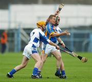 29 April 2007; Jonathan O'Neill, Wicklow, in action against Conor Dunne, left, and Matthew Whelan, Laois. Allianz National Hurling League, Division 2 Final, Wicklow v Laois, Semple Stadium, Thurles, Co. Tipperary. Picture credit: Brendan Moran / SPORTSFILE