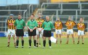 29 April 2007; Match officials James Owens, Seamus Roche, referee, and Johnny Ryan and members of the Kilkenny team stand for a minute's silence to honour former GAA President Con Murphy who died this morning. Allianz National Hurling League, Division 1 Final, Kilkenny v Waterford, Semple Stadium, Thurles, Co. Tipperary. Picture credit: Brendan Moran / SPORTSFILE