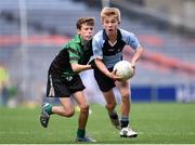 23 October 2014; Hugo McWade, St. Michael's, Ballsbridge, in action against Ruairi Hogan, left, St. Joseph's, Terenure, during the Scaith na nGearaltach final. Allianz Cumann na mBunscol Finals, Croke Park, Dublin. Picture credit: Pat Murphy / SPORTSFILE