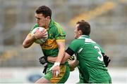 26 October 2014; Niall McNamee, Rhode, in action against Dessie Finnegan, St Patrick's. AIB Leinster GAA Football Senior Club Championship, First Round, Rhode v St Patrick's, O'Connor Park, Tullamore, Co. Offaly. Picture credit: Ramsey Cardy / SPORTSFILE