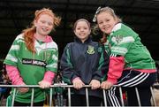 26 October 2014; Moorefield supporters, from left, Keira Finn, age 9, Ashling Corrigan, age 8, and Ella O'Neill, age 8, before the game. Kildare County Senior Football Championship Final Replay, Sarsfields v Moorefield. St Conleth's Park, Newbridge, Co. Kildare. Picture credit: Piaras Ó Mídheach / SPORTSFILE