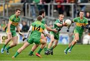 26 October 2014; Ray Finnegan, supported by Colin Goss, St Patrick's, in action against Niall McNamee, left, Anton Sullivan, centre, and Darren Garry, Rhode. AIB Leinster GAA Football Senior Club Championship, First Round, Rhode v St Patrick's, O'Connor Park, Tullamore, Co. Offaly. Picture credit: Ramsey Cardy / SPORTSFILE