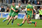 26 October 2014; Ray Finnegan,  St Patrick's, in action against Niall McNamee, supported by Anton Sullivan, Rhode. AIB Leinster GAA Football Senior Club Championship, First Round, Rhode v St Patrick's, O'Connor Park, Tullamore, Co. Offaly. Picture credit: Ramsey Cardy / SPORTSFILE