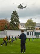 26 October 2014; A helicopter lands at a nearby GAA pitch during the half time break. AIB Leinster GAA Football Senior Club Championship, First Round, Rhode v St Patrick's, O'Connor Park, Tullamore, Co. Offaly. Picture credit: Ramsey Cardy / SPORTSFILE