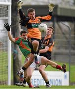 26 October 2014; Austin Stacks goalkeeper Darragh O'Brien, and Fearghal McNamara, in action against Gavan O'Grady, Mid Kerry. Kerry County Senior Football Championship Final, Austin Stacks v Mid Kerry. Austin Stack Park, Tralee, Co. Kerry. Picture credit: Diarmuid Greene / SPORTSFILE