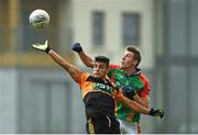 26 October 2014; Wayne Guthrie, Austin Stacks, in action against Tomas Ladden, Mid Kerry. Kerry County Senior Football Championship Final, Austin Stacks v Mid Kerry. Austin Stack Park, Tralee, Co. Kerry. Picture credit: Diarmuid Greene / SPORTSFILE