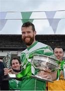 26 October 2014; Moorefield captain Ronan Sweeney with the Dermot Bourke Cup and his man of the match award after the game. Kildare County Senior Football Championship Final Replay, Sarsfields v Moorefield. St Conleth's Park, Newbridge, Co. Kildare. Picture credit: Piaras Ó Mídheach / SPORTSFILE
