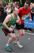 27 October 2014; Martin Murphy, left, and Padraic Lenehan on their way to finishing the SSE Airtricity Dublin Marathon 2014. Merrion Square, Dublin. Picture credit: Ray McManus / SPORTSFILE