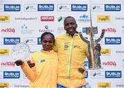 27 October 2014; Women's race winner Esther Wanjiru Macharia, Kenya, with Men's race winner Eliud Too, Kenya, at the SSE Airtricity Dublin Marathon 2014. Merrion Square, Dublin. Picture credit: Pat Murphy / SPORTSFILE