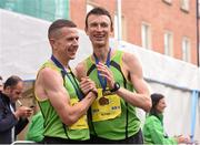 27 October 2014; Barry Minnock, Rathfarnham AC, who finished as the second Irish finisher in the men's race and Eoin Flynn, Rathfarnham AC, right, who finished as the third Irish finisher at the SSE Airtricity Dublin Marathon 2014. Merrion Square, Dublin. Picture credit: Pat Murphy / SPORTSFILE