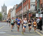 27 October 2014; The first group of runners make their way down Lord Edward Street during the SSE Airtricity Dublin Marathon 2014. Picture credit: Cody Glenn / SPORTSFILE