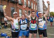 27 October 2014; French runners, from left, Pascal Husson, Cedric Morin, Stephane Saison and Yannick Tremenec after finishing the SSE Airtricity Dublin Marathon 2014. Merrion Square, Dublin. Picture credit: Ray McManus / SPORTSFILE