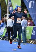 27 October 2014; Emlyn Lewis, Republic of Ireland, after finishing the SSE Airtricity Dublin Marathon 2014. Merrion Square, Dublin. Picture credit: Ramsey Cardy / SPORTSFILE