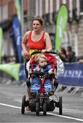 27 October 2014; Zieta O'Hagan, makes her way up Fitzwilliam Place at the start of the SSE Airtricity Dublin Marathon 2014. Fitzwilliam Place, Dublin. Picture credit: Ramsey Cardy / SPORTSFILE