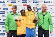 27 October 2014; SSE Airtricity Dublin Marathon 2014 race winners Esther Wanjiru Macharia, Kenya, and Eliud Too, Kenya, with Mark Ennis, Chairman SSE Ireland, left, and Jim Aughney, SSE Aitricity Dublin Marathon Race Director, right. Merrion Square, Dublin. Picture credit: Pat Murphy / SPORTSFILE