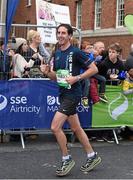 27 October 2014; Morgan Treacy, from Collon, Co. Louth, as he 'saunters' down Mount Street on his way to the finish of the SSE Airtricity Dublin Marathon 2014. Picture credit: Ray McManus / SPORTSFILE