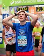 27 October 2014; Richard Hughes, from Westport, Co. Mayo, after finishing the SSE Airtricity Dublin Marathon 2014. Merrion Square. Dublin. Picture credit: Tomas Greally / SPORTSFILE