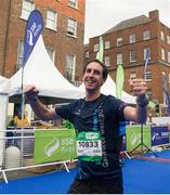 27 October 2014; Morgan Treacy, from Collon, Co. Louth, smiles as as he 'saunters' down Merrion Square on his way to the finish of the SSE Airtricity Dublin Marathon 2014. Picture credit: Ray McManus / SPORTSFILE