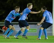 27 October 2014; Timmy Molloy, right, UCD, celebrates after scoring his side's first goal with team-mate's Colm Crowe, left and Chris Mulhall, right. SSE Airtricity League Promotion / Relegation Play-Off, First Leg, UCD v Galway United, The UCD Bowl, Belfield, Dublin. Picture credit: David Maher / SPORTSFILE