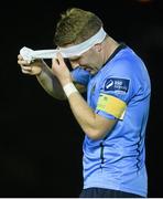 27 October 2014; Ian Ryan, UCD, removes a bandage at half-time. SSE Airtricity League Promotion / Relegation Play-Off, First Leg, UCD v Galway United, The UCD Bowl, Belfield, Dublin. Picture credit: David Maher / SPORTSFILE
