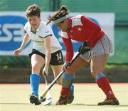 29 April 2007; Nadine Brown, Pegasus, in action against Mary Logue, Hermes. The 2007 ESB Women's Club Championships Final, Hermes v Pegasus, The National Hockey Stadium, University College Dublin, Belfield, Dublin. Picture credit: Pat Murphy / SPORTSFILE