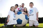 30 April 2007; Pictured at the launch of the 2007 Danone Nations Cup are, Irish &quot;Godfather&quot; Denis Irwin, ex Republic of Ireland soccer international, with children from Dublin, from left, Clodagh Scully, aged 5, Andrew Tobin, aged 11, 1 year old Alice Brannigan, Allanah Best, aged 9, and Brian Gleeson, aged 7. The national finals are due to take place here at the AUL Complex, Clonshaugh, Dublin on the 27th May 2007. AUL Complex, Clonshaugh, Dublin. Picture credit: David Maher/ SPORTSFILE