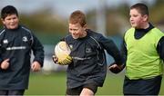 28 October 2014; Leo Anderson, centre, in action against Conall McCague, left, and Shane Ryan, during the Leinster School of Excellence on Tour in Athboy RFC. Athboy RFC, Co. Meath. Picture credit: Barry Cregg / SPORTSFILE