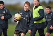 28 October 2014; Leo Anderson, centre, in action against Conall McCague, left, and Shane Ryan, during the Leinster School of Excellence on Tour in Athboy RFC. Athboy RFC, Co. Meath. Picture credit: Barry Cregg / SPORTSFILE