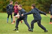 28 October 2014; Edward Hoey, centre, in action against Sean Quinn during the Leinster School of Excellence on Tour in Athboy RFC. Athboy RFC, Co. Meath. Picture credit: Barry Cregg / SPORTSFILE