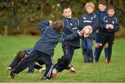28 October 2014; Conor McGoui, right, in action against Cóil O Muirí during the Leinster School of Excellence on Tour in Athboy RFC. Athboy RFC, Co. Meath. Picture credit: Barry Cregg / SPORTSFILE