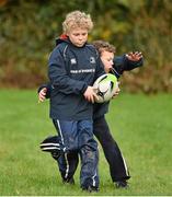 28 October 2014; Jeaic Murray, left, in action against Cóil O Muirí during the Leinster School of Excellence on Tour in Athboy RFC. Athboy RFC, Co. Meath. Picture credit: Barry Cregg / SPORTSFILE