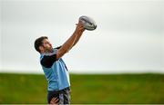 28 October 2014; Munster's Billy Holland wins possession in a lineout during squad training ahead of their Guinness PRO12 Round 7 game against Cardiff Blues on Saturday. Munster Rugby Squad Training, University of Limerick, Limerick. Picture credit: Diarmuid Greene / SPORTSFILE