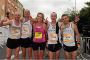 27 October 2014; Participants, from left, Eamon Dunbar, Michael O'Connell, Lucy Brennan, David Kearins, Seamus Somers, all from Sligo AC, after finishing the SSE Airtricity Dublin Marathon 2014. Merrion Square. Dublin. Picture credit: Tómas Greally / SPORTSFILE