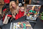 29 October 2014; Conor Mortimer's niece Mia Mortimer, one year old, with her mother Glenda, from Claremorris, Co. Mayo, during the launch of the book 'One Sunday: A Day in the Life of the Mayo Football Team' by Conor Mortimer with Jackie Cahill (published by Hero Books, priced €16.99). McWilliam Hotel, Claremorris, Co. Mayo. Picture credit: Ray Ryan / SPORTSFILE