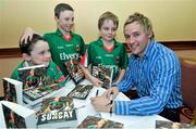 29 October 2014; Conor Mortimer with Brothers Colin, Evan and Ross Gibbons from Shrule, during the launch of his book 'One Sunday: A Day in the Life of the Mayo Football Team' by Conor Mortimer with Jackie Cahill (published by Hero Books, priced €16.99). McWilliam Hotel, Claremorris, Co. Mayo. Picture credit: Ray Ryan / SPORTSFILE