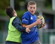 30 October 2014; Jamie Clancy, from Celbridge, Co. Kildare, is tackled by Donncha O'Keeffe, from Blanchardstown, Co. Dublin, during the Leinster School of Excellence on Tour in Westmanstown RFC, Westmanstown, Co. Dublin. Picture credit: Matt Browne / SPORTSFILE