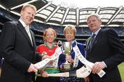 8 May 2007; Carlow captain Maria Coady with Liz Howard, President of the Camogie Association, Liam Peters, right, Executive Chairman Gala and Gary Desmond, CEO Gala, at the launch of the Gala All-Ireland Senior and Junior Camogie Championships. Croke Park, Dublin. Photo by Sportsfile
